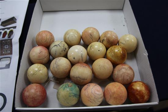 A collection of twenty early 20th century ivory snooker balls, each approx. 2in.